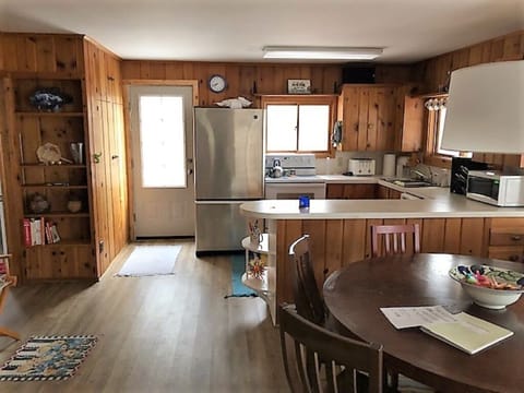 Dining area and kitchen, from the living room.
