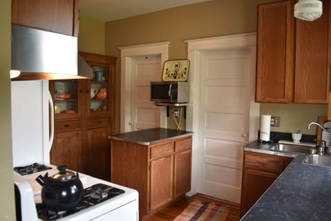 Kitchen with Fiesta dishes that say lets eat in....