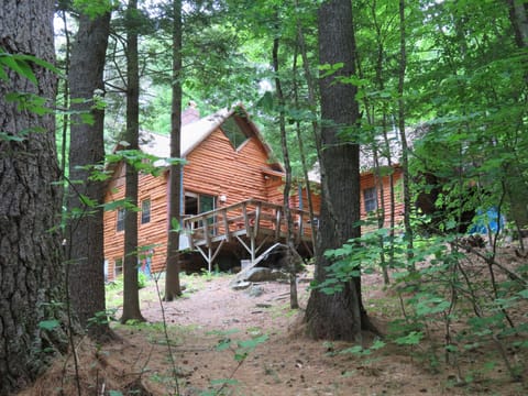 Looking up at the house from the path to Squam Lake