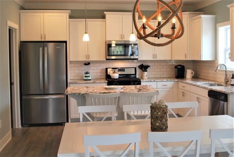 Fully equipped kitchen with all tools, utensils and dishes needed.