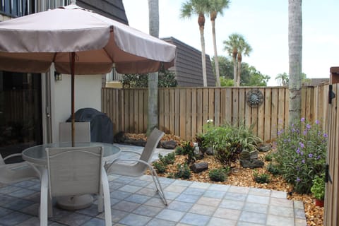 outdoor, beautifully landscaped fenced private patio