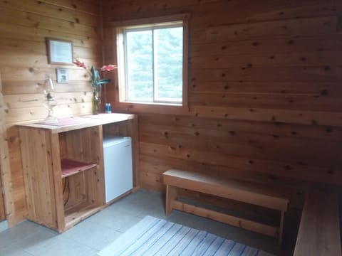 Changing room with a refrigerator in case you need something cold after the hot 