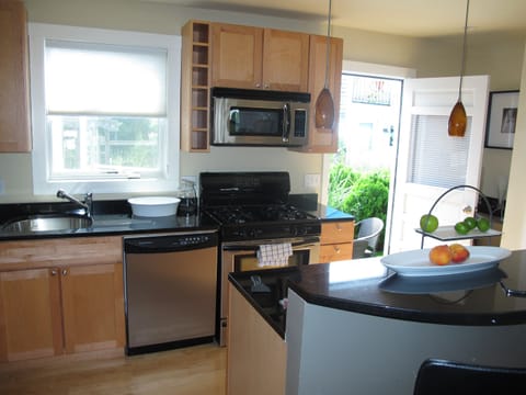 Kitchen and door to outdoor patio.