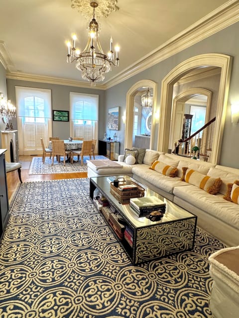 living room with table for 6 at one end