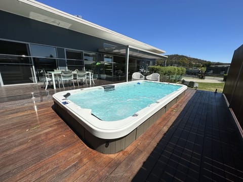 Large, heated swim spa.