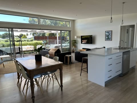 Large open-planned living area, kitchen and meals.