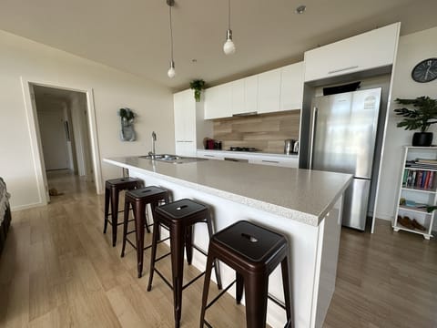 Fully appointed kitchen and breakfast bar.