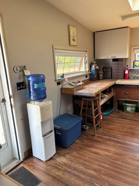 Bottled water dispenser in laundry room