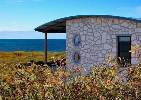 Local limestone construction nestles into the untouched landscape