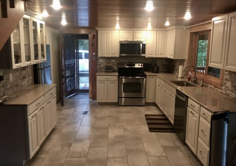 Full view of kitchen to front door