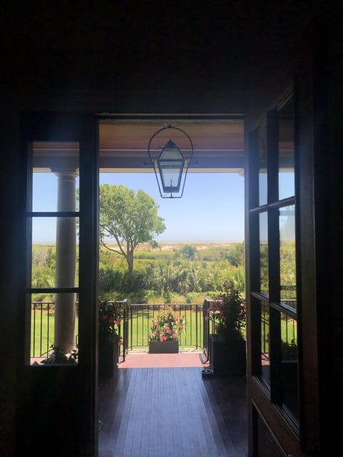 Large Mahogany doors to all outside spaces. 