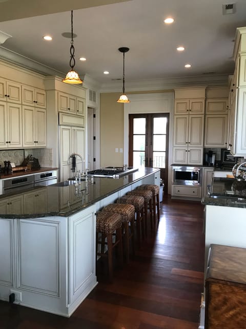 Fabulous fully equipped kitchen with 2 sinks, 2 ovens, 2 DWs, & wine cooler.
