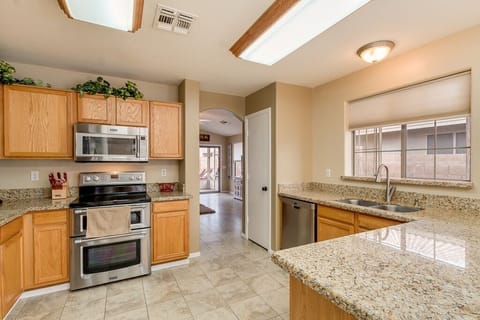 Kitchen opens up to the Family Room