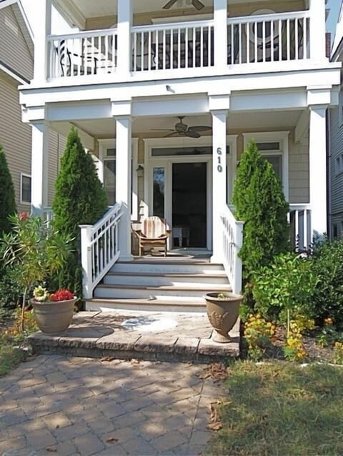 Owner in front of property