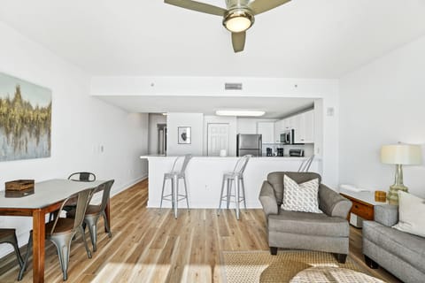 Large living area with ocean views and comfortable queen memory bed pullout