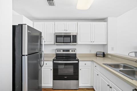 Gourmet kitchen stocked with all the essentials for cooking and dining