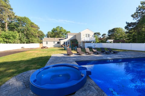 Hot tub with spill over spa. This shows just how big the back yard property is