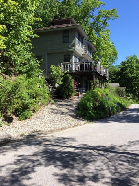 view of the house from the end of the driveway facing north