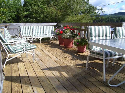 Seating and dining areas on the deck