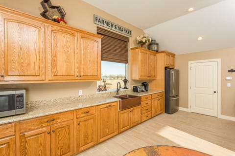Pool House Kitchenette.  Full Size Fridge, Microwave and Sink.