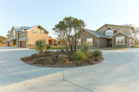 Entry Drive with tons of parking space.  RV hookup is on concrete drive also.