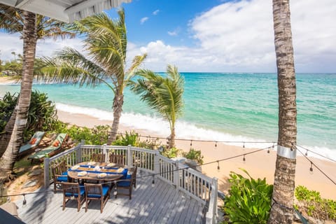 Shot from the upstairs living room lanai, showing our great beachside space.
