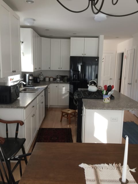Kitchen with granite counters.
