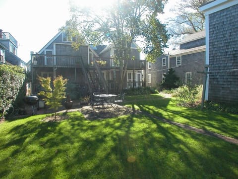 Shady backyard for relaxing and grilling ...