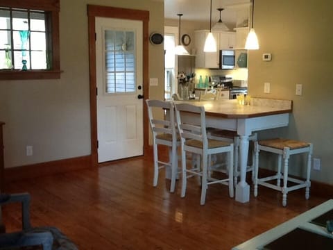 Bar with five stools for additional seating