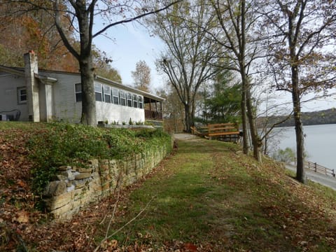 Both decks shown at Lake Shore Cabin.  Fire pit with wood is now right in front.