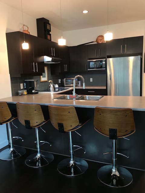 Comfy bars stools at the kitchen counter
