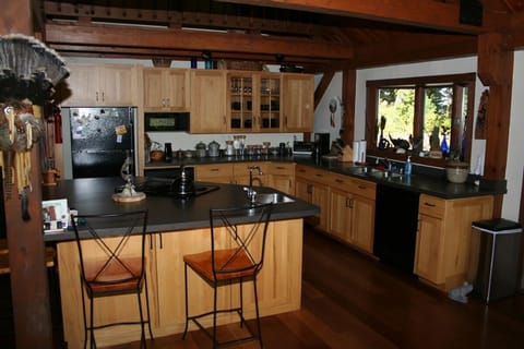Open kitchen with island and second sink
