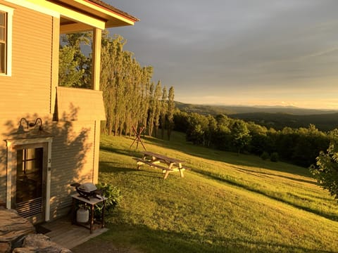 Private entry and grill. A picnic table overlooking the Greens. 
