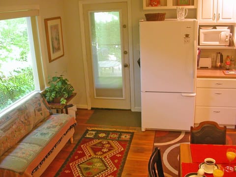 Eat-In Kitchen looking toward entry deck and ravine view.