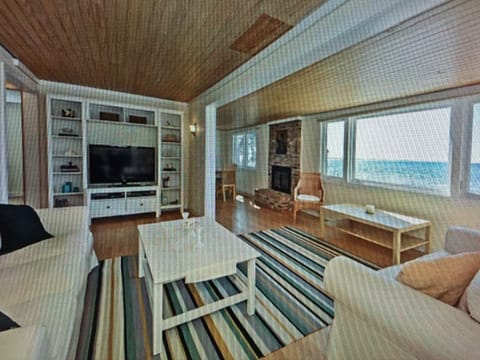 Open living area with beautiful view of water