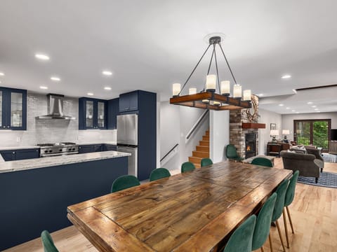 A kitchen and dining layout that's Ideal for meal prep and family dinners. 