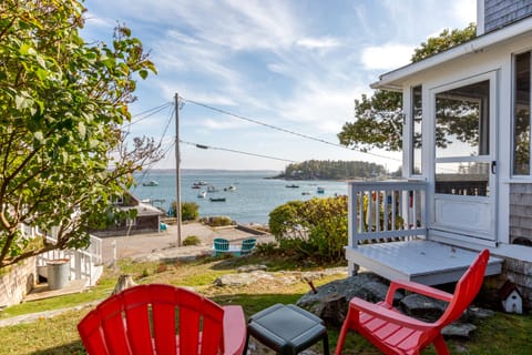 Relax on the back lawn watching the harbor activity
