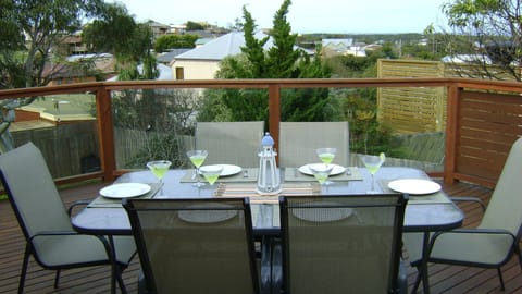 Elevated Balcony peaceful setting with a distant view of the Ocean.