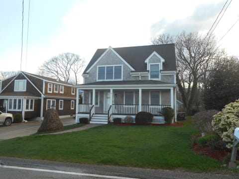 The front, with farmers porch overlooking the water
