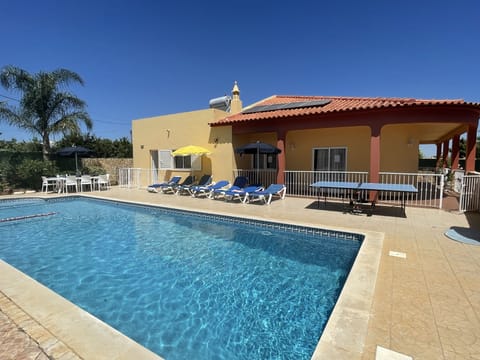 Air Conditioning, 4 bedrooms, 5 bathrooms, large private pool with optional pool heating, gated & fenced pool.
