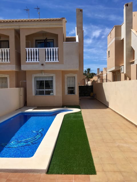 Front of house and pool