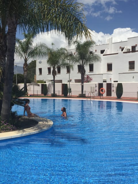 Enjoying our lovely pool right outside our front door!
