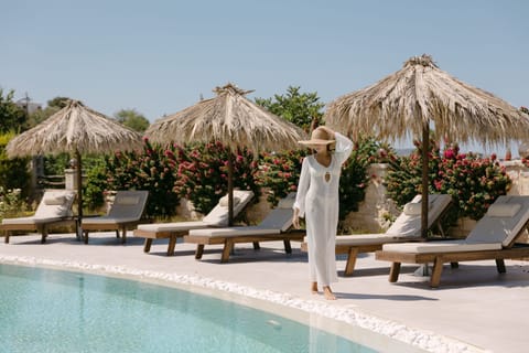 Discover refined villa living, where bespoke design meets serene surroundings.