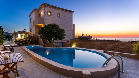 Heated swimming pool area in the late afternoon (heated pool available upon advance request with an additional fee)