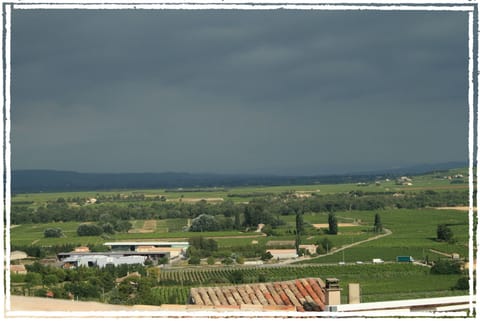 View from the church garden to the west with a thunderstorm on the way