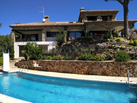View from private swimming pool up to villa