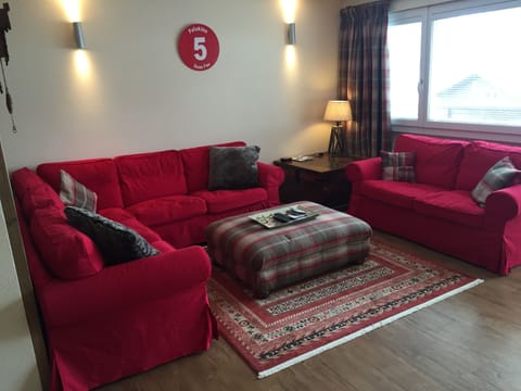 lounge (doors lead to a wide wrap around south facing balcony)