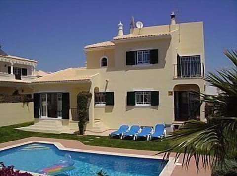 View of pool and house from rear garden