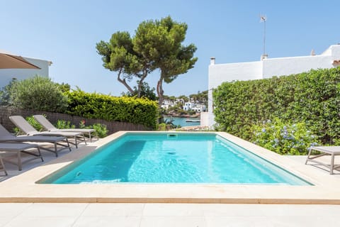 Heated swimming pool overlooking marina