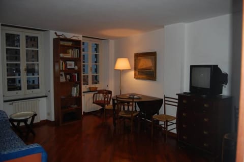 The living room in the evening with views of marina